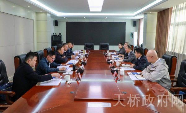 孙战宇会见来访客商